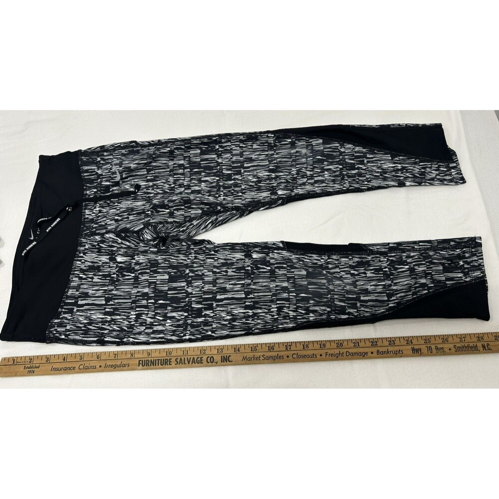 Nike Dri-FIT Women's knee length Leggings Abstract Stretch Zipper Pocket S Black